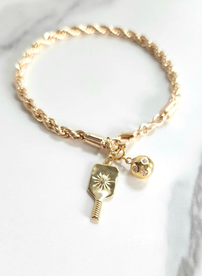 Gold Rope Chain Bracelet with removable Starburst Crystal Pickleball Paddle Charm and Crystal Pickleball Ball Charm.