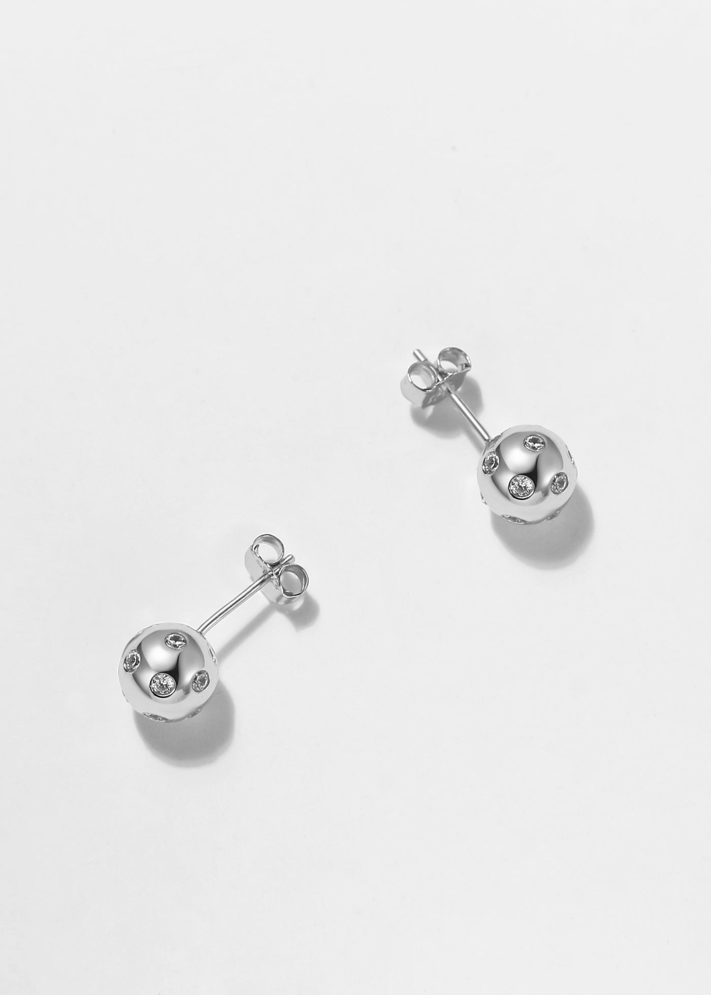 Silver. Pickleball Ball Stud Bling Earrings.Made from sterling silver with a protective rhodium plating. 8mm diameter.
