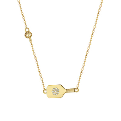 Pickleball Dainty Dinker Flower Paddle Mini Gold Necklace. Top quality CZ stone'flower' is set in the center of the paddle, and the pickleball charm sits further up the necklace. We have created a modern dainty clip chain for the necklace, and have added 2" of extender chain so you can wear this between 15" and 17". made from 14k gold over sustainably sourced sterling silver.