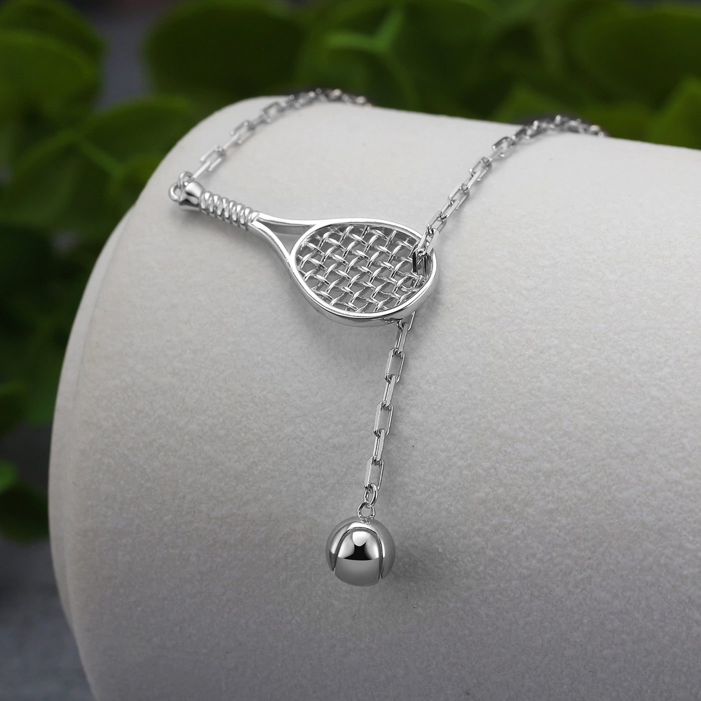 Lovematch Designs Silver Lariat Necklace featuring a tennis racquet with  tennis ball that feeds through racquet and hangs elegantly. Adjustable Chain Length.