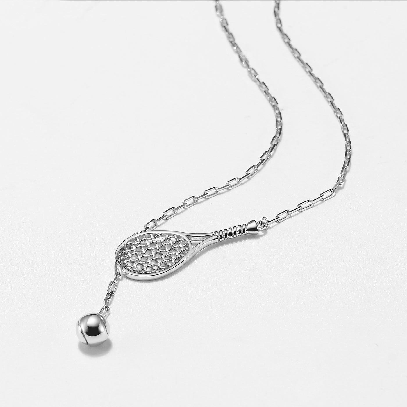 Lovematch Designs Silver Lariat Necklace featuring a tennis racquet with  tennis ball that feeds through racquet and hangs elegantly. Adjustable Chain Length.