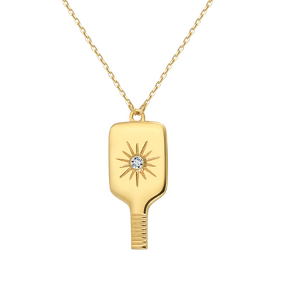 Fine Pickleball Paddle Pendant Necklace Solid 14k Gold with Diamond featuring a perfectly proportioned pickleball paddle with an impact center burst to imitate the instant the pickleball is hit. A pretty sparkling real non-farmed diamond marks the spot!