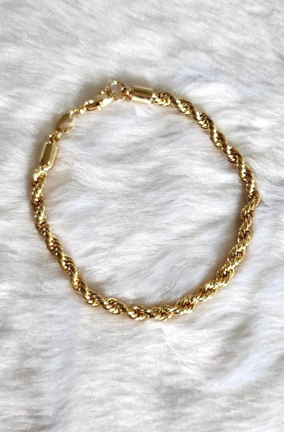 Elegant gold-filled high quality rope chain bracelet. 7" with a lobster clasp and comes with branded microsuede pouch. Wear as is or add in any of our themed charms for added wow factor.