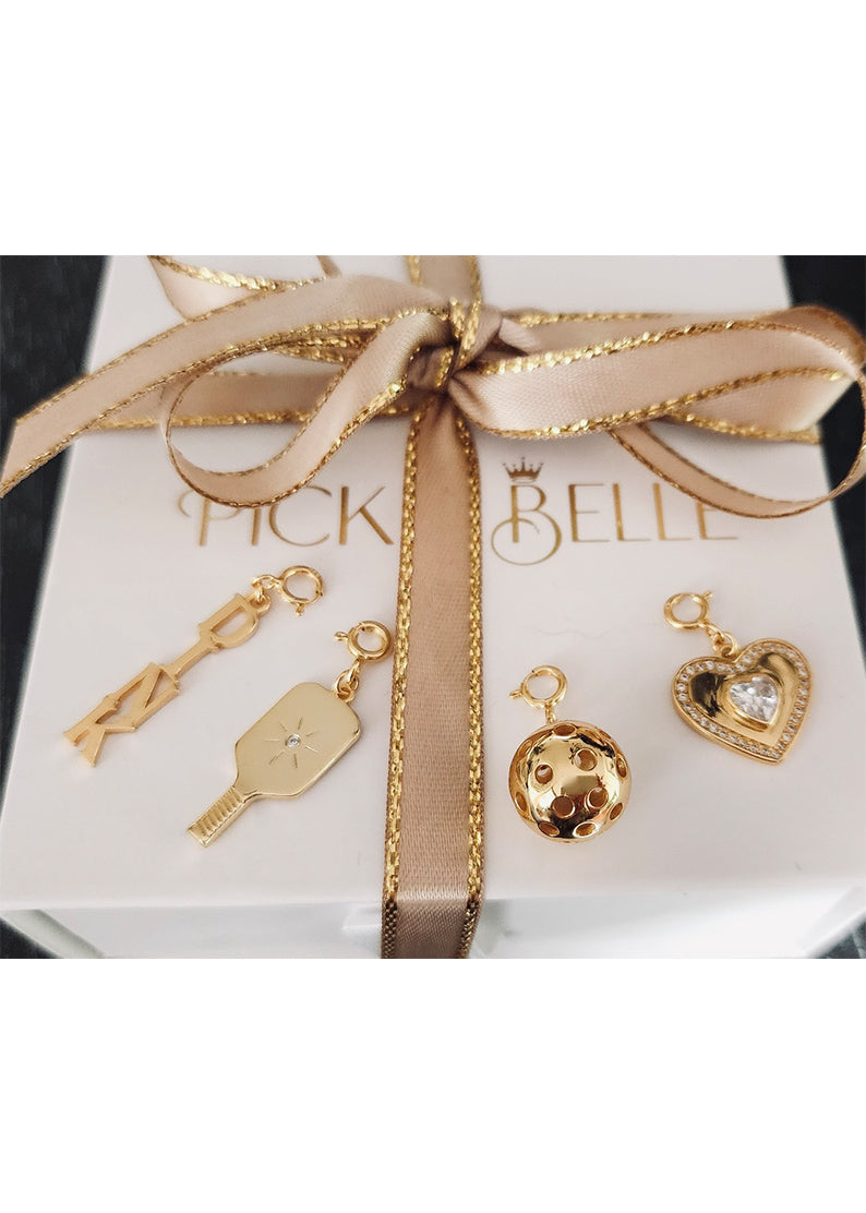 Gold Pickleball Ball Charm. Made from 18k gold over sterling silver, with a robust 1/2 diameter ball will be really noticed and admired.