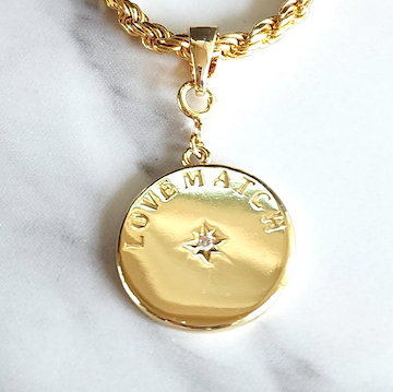 Chic Gold Tennis Heart Disc Pendant Charm featuring  double sided pendant charm with 2 racquets creating a 'heart' with impact crystal inside each and our LoveMatch insignia on the reverse with a sparkling crystal center. 