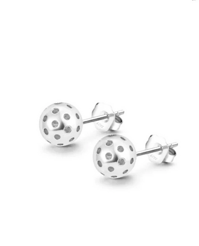 Pickleball Ball Stud Earrings in Silver. A pair of intricately designed petite pickleballs. Made from sterling silver with a protective Rhodium plating.