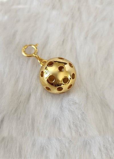 Gold Pickleball Ball Charm. Made from 18k gold over sterling silver, with a robust 1/2 diameter ball will be really noticed and admired.